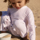 Snap opening detail of baby full-body swimsuit MIKOU
