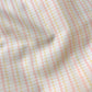 Close-up of fabric print pattern with pink and yellow checkered pattern