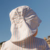 baby sun hat made with UPF50+ fabric, with wider brim at the back | MIKOU